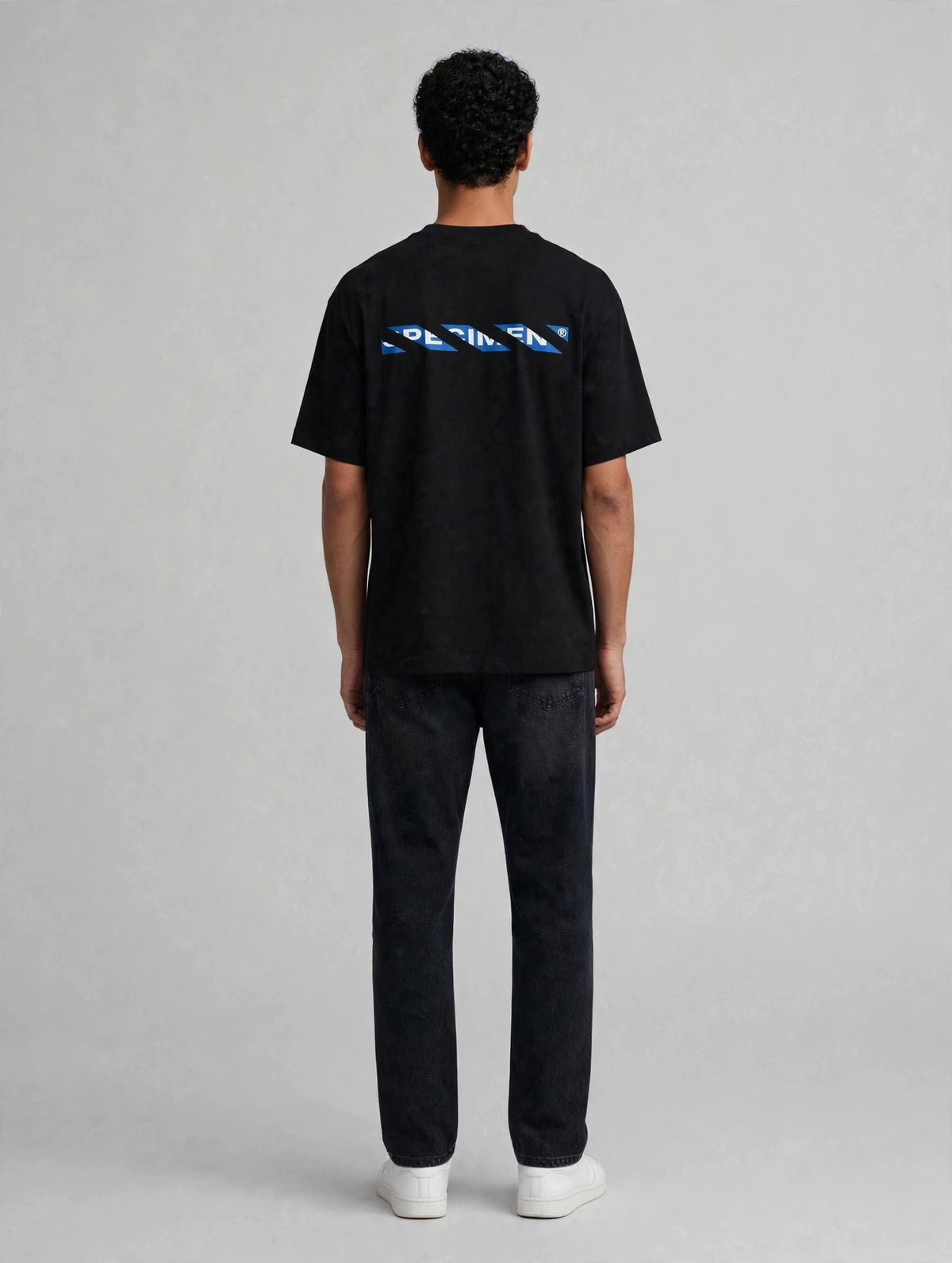 Half Show Diagonal Tee back graphic on model